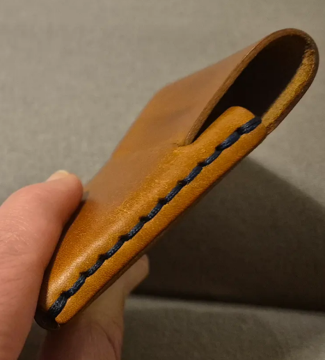 Stitsching wallet with slit