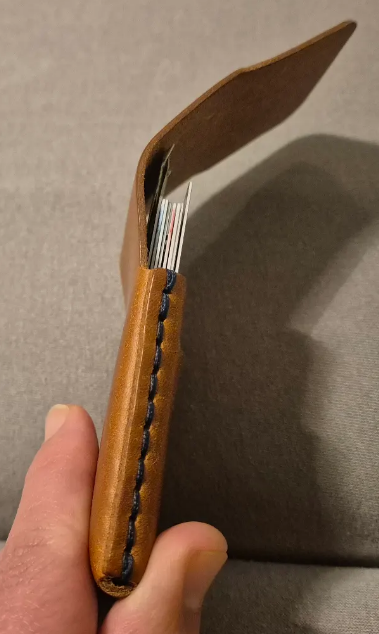 Stitsching wallet with slit